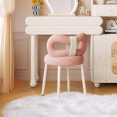 Gentle pink vintage butterfly chair with creamy finish, perfect for makeup and vanity use